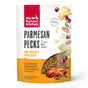 A white resealable bag of The Honest Kitchen Dog Treat Parmesan Pecks, Duck & Cherry, featuring images of cheese, cherries, and treats with orange and white product details.