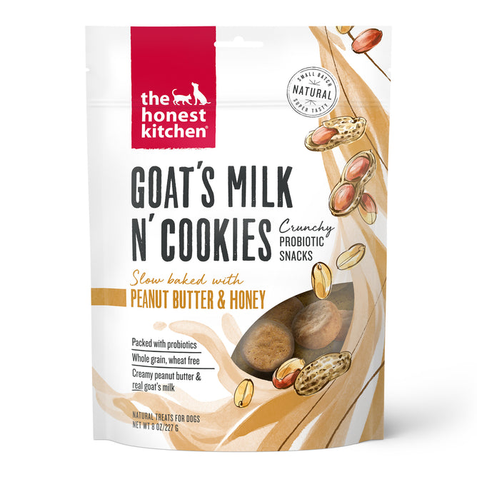 A bag of The Honest Kitchen Dog Treat Peanut Butter & Honey Goats Milk N Cookies, crunchy probiotic snacks with natural ingredients, features peanut illustrations and highlights probiotic benefits.