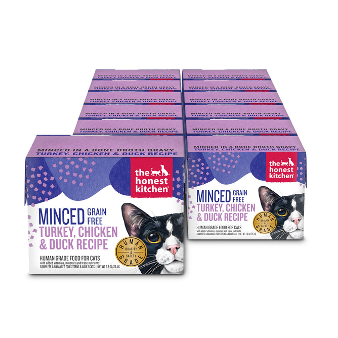 A 12-pack of The Honest Kitchen Minced Wet Cat Food Turkey, Chicken & Duck in Bone Broth Gravy, with a close-up cat face and product info on purple and white packaging.