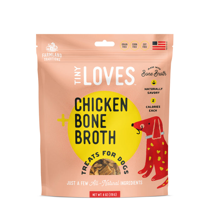 A 5 oz package of Farmland Traditions Tiny Loves - Chicken with Bone Broth Treats, in an orange bag with a playful dog illustration, offers grain-free, corn-free, soy-free, high-fiber treats made from real bone broth.