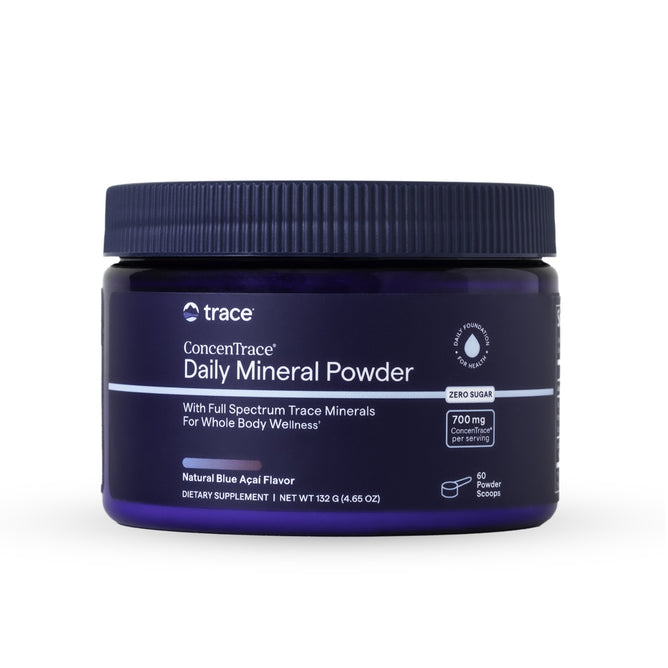 A blue container of Trace Minerals ConcenTrace Daily Mineral Powder with a black lid, highlighting 700 mg full spectrum trace minerals, zero sugar, and natural blue acai flavor—a daily wellness supplement.