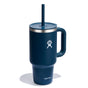 A dark blue Hydro Flask Travel Tumbler, 32 oz, features double-wall vacuum insulation, a handle, a lid with a straw, and a white logo of an outstretched person above the elegantly printed brand name.