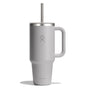 The Hydro Flask Travel Tumbler, 40 oz, is a grey insulated tumbler with a handle and leak-resistant lid featuring a straw. It highlights the Hydro Flask logo with double-wall vacuum insulation for a sleek, modern look.