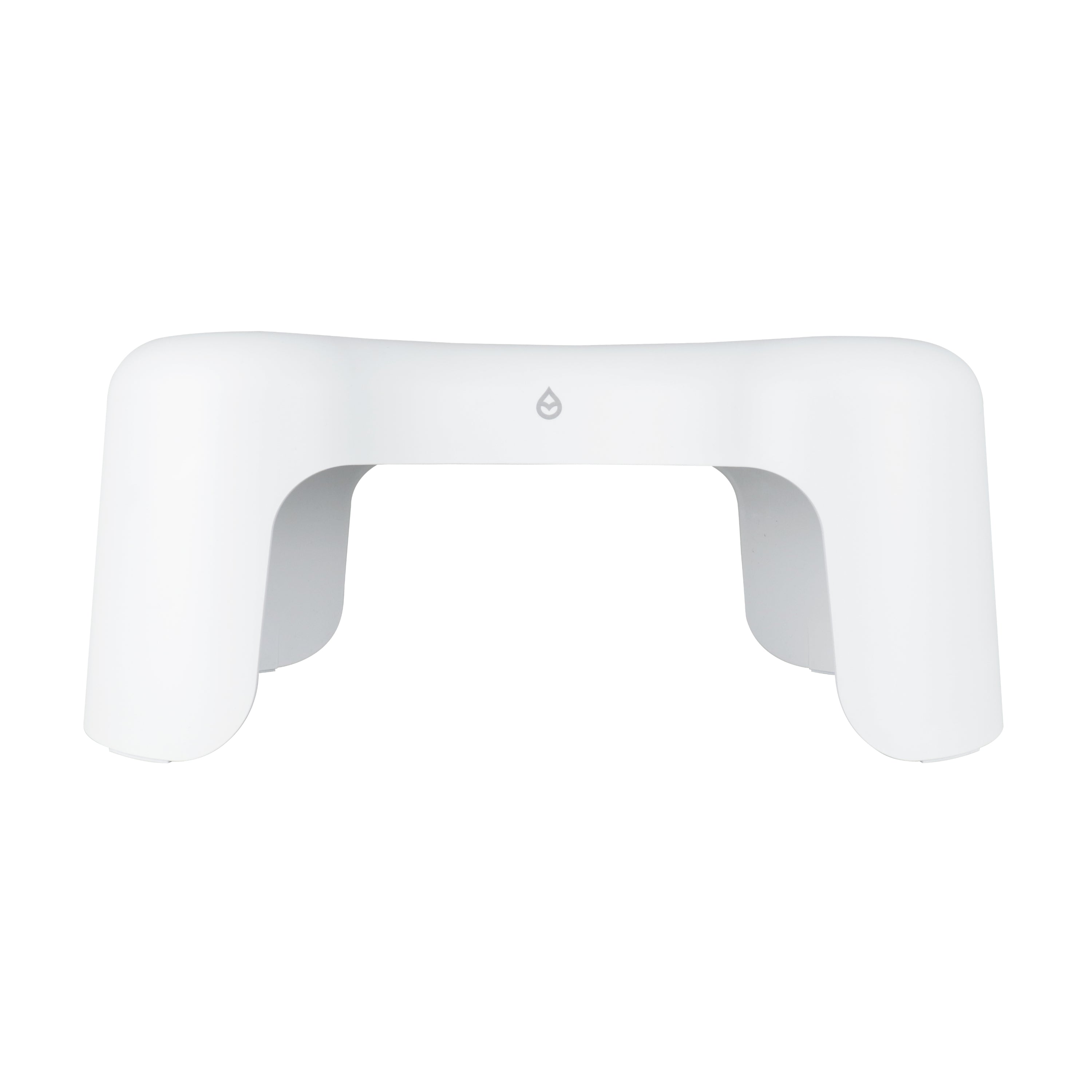 The TUSHY Arc Toilet Stool is a white, curved plastic stool with four wide legs and an open front, featuring a centered water droplet symbol. Designed to fit over your toilet, it promotes better posture while you go.