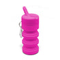 The TUSHY Travel Portable Bidet is a bright pink, collapsible bottle with a ridged body, flip-top spout, and metal carabiner—perfect for on-the-go cleaning.