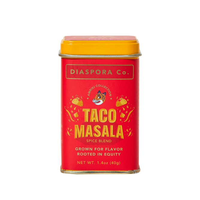 A red and yellow tin labeled Taco Seasoning from Diaspora Spice Co., made with single-origin spices, features taco illustrations and the phrase "Grown for flavor, rooted in equity." Contains 1.4 oz (40g) of spice blend.