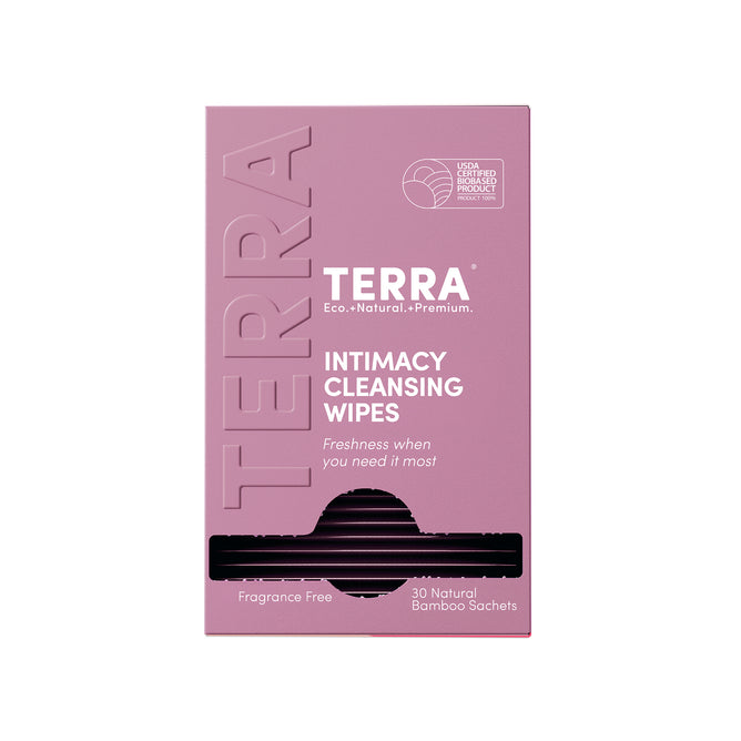 A pink box labeled Terra Intimacy Wipes - Daily PH Balancing, Fragrance & Sulfate Free, Individually Wrapped. The box features 30 natural bamboo sachets and a USDA Certified Biobased Product logo.