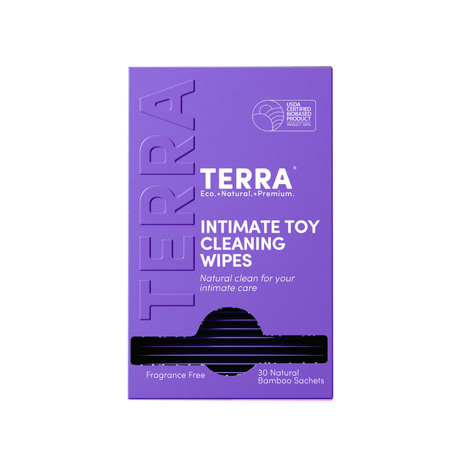 A purple box labeled Terra Initimate Toy Cleaning Wipes, Individually Wrapped, features the USDA Certified Biobased Product logo. The box contains 30 fragrance-free, natural antibacterial bamboo wipes in sachets.
