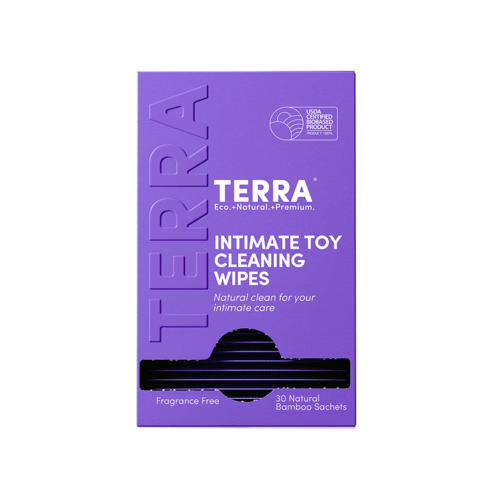 A purple box labeled Terra Initimate Toy Cleaning Wipes, Individually Wrapped, features the USDA Certified Biobased Product logo. The box contains 30 fragrance-free, natural antibacterial bamboo wipes in sachets.