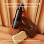 The Body Sculpting Set by Ember Wellness, featuring hydrating body oil, a wooden massager, sponge, and serum bar, is arranged on soft tan fabric. Text highlights a ritual for sculpted, radiant skin above and below the display.