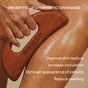 A hand uses Ember Wellness' The Body Sculpting Set and hydrating body oil to massage an oiled thigh. Text highlights lymphatic drainage benefits: improved skin texture, increased circulation, reduced cellulite, and less swelling.