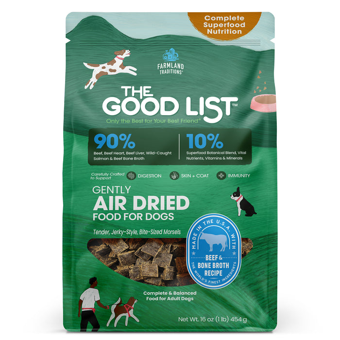 A green bag of The Good List by Farmland Traditions Beef & Bone Broth Recipe, Food, Topper, and Mixer for Dogs, featuring 90% animal ingredients, 10% superfoods, and playful dog illustrations on the packaging.