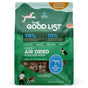 A green bag of The Good List by Farmland Traditions Beef & Bone Broth Recipe dog food topper and mixer displays playful dogs, product pieces, and highlights 90% animal protein and 10% superfoods for adult dogs seeking premium nutrition.