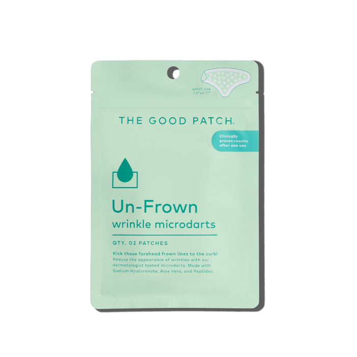 A mint-green packet from The Good Patch holds Un-Frown Wrinkle Microdart Patches, designed to reduce forehead wrinkles and fine lines. The packaging features a small patch illustration and key product details.