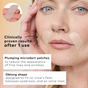 A fair-skinned woman wears two Un-Wrinkle Microdart Patches by The Good Patch on her cheeks. The oblong patches target fine lines and wrinkles with clinically proven results.