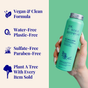 A hand holds The Powder Shampoo Exfoliating Shampoo—a green bottle. Text highlights: vegan, water-free, plastic-free, sulfate- & paraben-free, with tea tree oil. Each item sold plants a tree. Illustrations showcase these benefits.