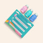 Three colorful bottles (pink, blue, and purple) of The Powder Shampoo’s "Soar to New Heights" are arranged above a vibrant teal info card with rainbows, clouds, playful accents, product illustrations, and detailed text sections.
