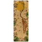 The Tiger Lotus Aura Cork Yoga Mat by Yoloha Yoga showcases a sustainable design with a tiger walking on sand, surrounded by green leaves, pink flowers, and tall bamboo beneath a large yellow sun.