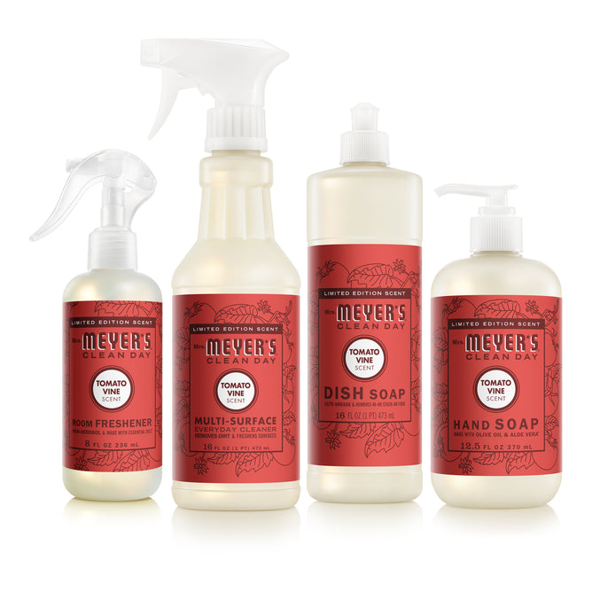 Four Mrs. Meyer’s Endless Summer Cleaning Set products—dish soap, hand soap, multi-surface cleaner, and room freshener—each with red labels and the Tomato Vine scent, are shown side by side on a white background.