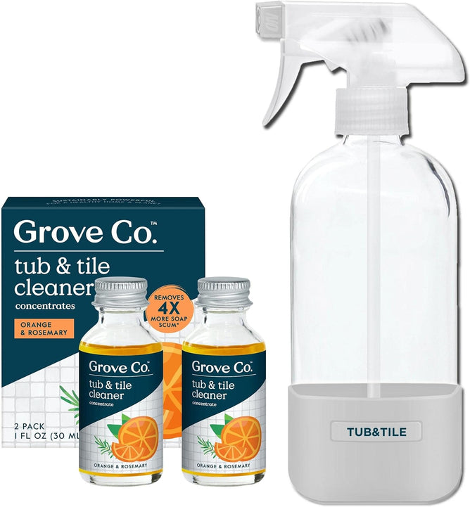The Grove Co. Tub & Tile Cleaner Concentrate Starter Pack Bundle - Orange & Rosemary includes two concentrate bottles, a reusable glass spray bottle with a gray base, and the slide and snap labeling system for easy identification.