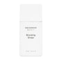 A minimalist rectangular white bottle labeled Uncommon Beauty Bronzing Drops in black text holds 33 mL (1.16 fl oz), delivering a sunkissed, post-vacation glow.