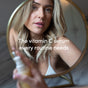 A blonde woman looks into a round mirror holding Uncommon Beauty’s Enhanced Pineapple Peptide Nectar; text on the image reads, The vitamin C serum every routine needs.
