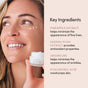 A smiling woman applies Uncommon Beauty’s Enhanced Triple Effect Eye Cream under her eyes. Beside her, text spotlights pineapple extract, Kakadu plum, Argireline, and hyaluronic acid for brightening and smoothing skin.