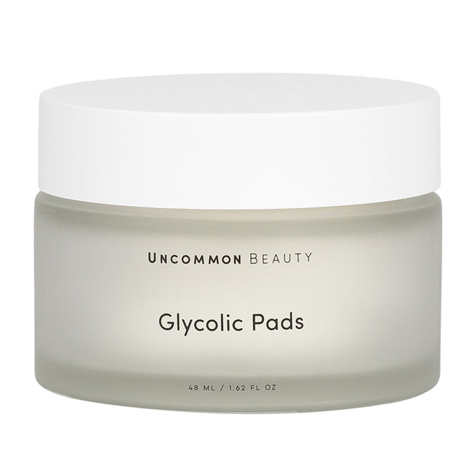 Uncommon Beauty Glycolic Pads come in a frosted jar with a white lid, containing 48 ml (1.62 fl oz) of exfoliating pads to help minimize pores and refresh your skin.