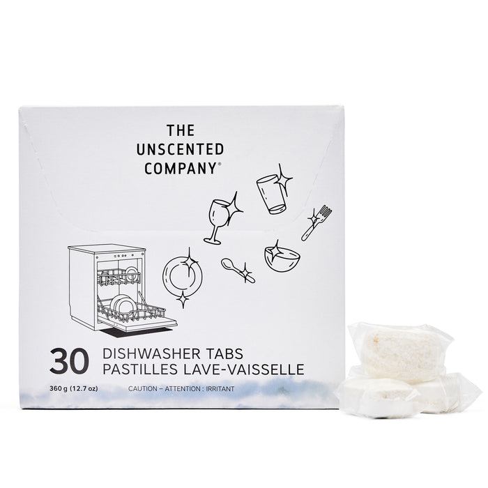 A box of The Unscented Company Dishwasher Tabs, with simple dish-themed line art, sits beside two white vegan dishwasher tabs wrapped in plastic.