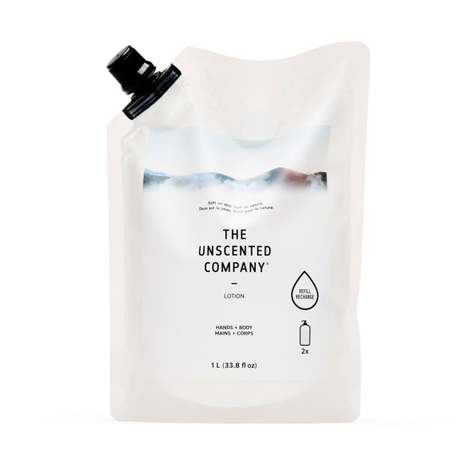 The Unscented Company Lotion Refill - Unscented: A 1L vegan hand and body lotion pouch with a black cap and minimalist white label, designed as a refillable product to keep your skin moisturized.