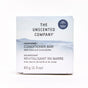 A 65g (2.3 oz) Conditioner Bar by The Unscented Company, plastic-free with shea and cocoa butter, in white packaging with soft blue accents and bilingual English/French text.