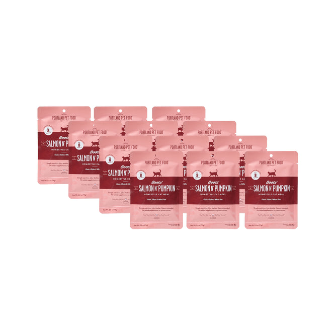 Six pink pouches of Boots Salmon N Pumpkin Homestyle Wet Puree Cat Food by Portland Pet Food Company are arranged in staggered rows, highlighting the human-grade, grain-free recipe on a clean white background.