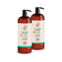 Two brown pump bottles labeled Tea Tree Shampoo & Conditioner 1 Liter Luxe from Soapbox are shown on a white background. The labels highlight their deep cleansing, vegan, color safe, and hard sulfate free formula for hair and scalp.