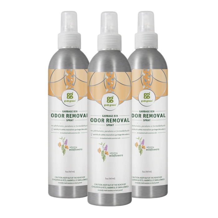 Three bottles of grab green Garbage Pail Odor Removal Spray - 3 Pack - Wild Flowers, made with odor neutralizing spray technology and essential oils for garbage bins, stand side by side against a white background.