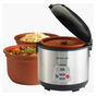 The VitaClay® Chef VITACLAY 4-IN-1 ORGANIC RICE N’ SLOW COOKER IN CLAY POT VF7700 is displayed with its stainless steel exterior and open lid, revealing the natural clay pot insert. Next to it are clay pots containing cooked rice and a hearty stew, showcasing how this organic rice cooker enhances both flavor and nutrition for wholesome homemade meals.