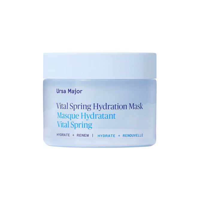 A light blue Ursa Major Vital Spring Hydration Mask jar with blue label text sits on a white background—ideal for delivering skin-plumping hydration to dry skin.