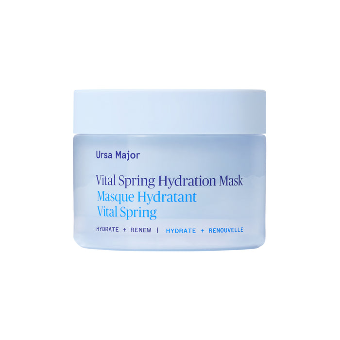 A light blue Ursa Major Vital Spring Hydration Mask jar with blue label text sits on a white background—ideal for delivering skin-plumping hydration to dry skin.