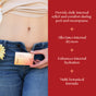 A person in jeans holds a Foria Vibrance Melts with Organic Botanicals box near their bare stomach. Beside them, text on a red background highlights: relief during menopause, internal hydration, alleviates dryness, multi-botanical formula.