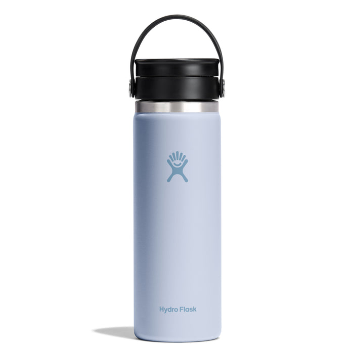 The Hydro Flask Wide Mouth Bottle with Flex Sip Lid™, designed for coffee and tea, features a light blue color, black lid and handle. Its leakproof TempShield double-wall insulation keeps drinks hot or cold, with the Hydro Flask logo enhancing its sleek design. Capacity: 20 oz.