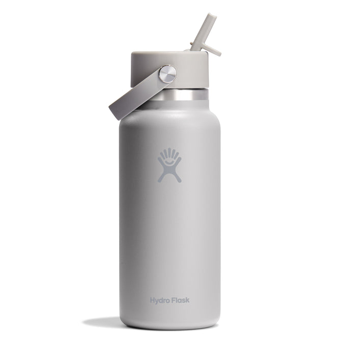 The Hydro Flask Wide Mouth Bottle, 32 oz, is white with double-wall insulation, a gray lid and handle. It includes a flip straw for leakproof use and features the Hydro Flask logo.