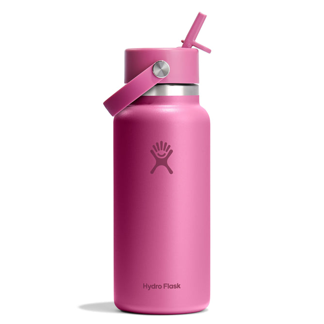 The pink 32 oz Hydro Flask Wide Mouth Bottle with Flex Straw Cap is leakproof and includes a side carrying strap. Its sleek matte finish and centered iconic logo make it an ideal adventure companion.