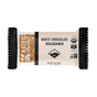 A packaged Kates Real Food Organic Energy Bar - White Chocolate Macadamia shows part of the nut and oat bar inside. The wrapper notes its USDA organic, gluten-free, non-GMO, made with organic oats and whole-food ingredients. Net weight: 2.2 oz (62g).