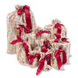 The Set of 10 Reusable Gift Bags - Nutcracker Harlekin by Waste Free Celebrations features a colorful geometric pattern with bright red satin ribbons, arranged together on a white background.