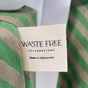 A fabric tag on the Set of 5 Reusable Gift Bags - Green Stripes by Waste Free Celebrations reads Made in Afghanistan, highlighting their use as sustainable, reusable gift wrap.