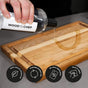 A hand pours WoodForChef Food Grade Mineral Oil for Wood Cutting Board onto a wooden board. Three icons show the features: 100% natural, prolongs life, mess-free, and easy application.