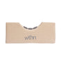 The WTHN Acupressure Neck Wedge is a beige rectangular fabric pillow with a curved notched center featuring small spikes for neck tension relief. "wthn" appears in gray on the front.
