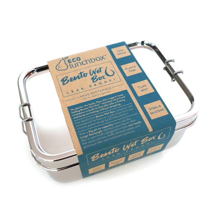 The EcoLunchBox Bento Wet Box™ Stainless Steel Food Container - Large Rectangle is leakproof, features a brown and blue label, and offers a plastic-free design made from steel and silicone.
