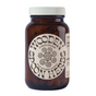 A brown glass bottle labeled Wooden Spoon Herbs Stress Savior Capsules, a dietary supplement with 90 capsules. The label displays a decorative swirl, emphasizing its blend of adaptogenic herbs for natural stress relief.