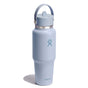 The Hydro Flask Wide Mouth Travel Bottle, 32 oz, features a light blue matte finish, sleek design, iconic logo, and a top handle.