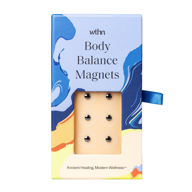 A box labeled “Body Balance Magnets” by WTHN features a blue, yellow, and orange abstract design and contains six small round magnets on beige adhesive patches. Tagline: Ancient Healing, Modern Wellness.